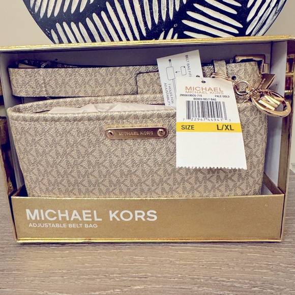 Michael Kors Handbags - NWT Michael Kors pale gold boxed belt bag L/XL